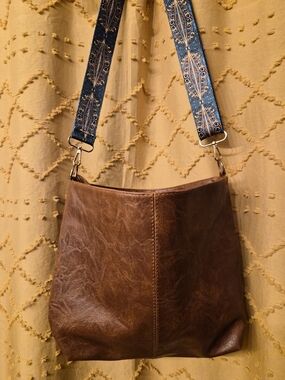 Brown Faux Leather Bucket Bag with Patterned Blue Strap